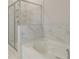 Spa-like bathroom with marble shower and soaking tub at 25 Homesite Cooper E Cv, Fayetteville, GA 30215
