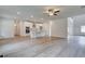 Open concept kitchen with large island and stainless steel appliances at 25 Homesite Cooper E Cv, Fayetteville, GA 30215