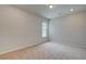Bright and spacious bedroom with neutral carpeting at 25 Homesite Cooper E Cv, Fayetteville, GA 30215