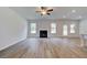 Spacious living room with fireplace and hardwood floors at 25 Homesite Cooper E Cv, Fayetteville, GA 30215