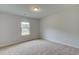 Simple bedroom with window and carpet at 25 Homesite Cooper E Cv, Fayetteville, GA 30215