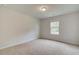 Simple bedroom with window and carpet at 25 Homesite Cooper E Cv, Fayetteville, GA 30215