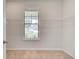 Large walk-in closet with window and wire shelving at 25 Homesite Cooper E Cv, Fayetteville, GA 30215