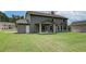 House features a large backyard with covered patio at 25 Homesite Cooper E Cv, Fayetteville, GA 30215