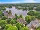 Luxury homes surround a lake in a upscale community at 2867 Darlington Run, Duluth, GA 30097