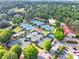 Aerial view of tennis courts, pool, and clubhouse at 2867 Darlington Run, Duluth, GA 30097