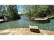 Infinity pool with pebble finish and lake views at 2867 Darlington Run, Duluth, GA 30097