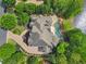 Luxury home with a large driveway and pool, lakefront property at 2867 Darlington Run, Duluth, GA 30097