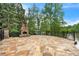Stone fireplace on a flagstone patio overlooking the lake at 2867 Darlington Run, Duluth, GA 30097