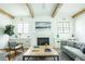 Living room with fireplace and built-in shelving at 1277 Avalon Ne Pl, Atlanta, GA 30306