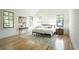 Spacious main bedroom with hardwood floors and large windows at 1277 Avalon Ne Pl, Atlanta, GA 30306