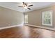 Spacious bedroom with hardwood floors and ceiling fan at 309 Marbella Way, Mcdonough, GA 30252