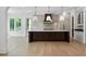 Modern kitchen with large island and custom cabinetry at 1068 Moores Mill Nw Rd, Atlanta, GA 30327