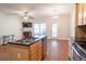 Kitchen with island, stainless steel appliances, and wood cabinets at 2986 Ashlyn Pointe Dr, Atlanta, GA 30340