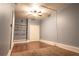 Finished basement room with wood flooring, ceiling fan, and ample storage at 2986 Ashlyn Pointe Dr, Atlanta, GA 30340