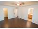Main bedroom with ceiling fan, hardwood floors and ensuite bathroom at 2986 Ashlyn Pointe Dr, Atlanta, GA 30340