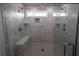 Spacious shower with double shower heads and built-in bench at 1210 Red Oak Blvd, Loganville, GA 30052