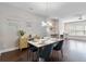 Modern dining room with a stylish chandelier and hardwood floors at 1405 Attwater Dr, Atlanta, GA 30316