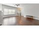 Hardwood floor living room with built in shelving and fireplace at 1405 Attwater Dr, Atlanta, GA 30316