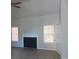 Spacious living room with fireplace and hardwood floors at 3475 Washington Rd, Atlanta, GA 30344