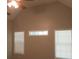 Spacious bedroom with high ceilings and windows at 3475 Washington Rd, Atlanta, GA 30344