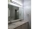 Double vanity bathroom with granite countertop at 3475 Washington Rd, Atlanta, GA 30344