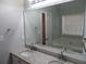 Bathroom with double vanity, granite countertop, and large mirror at 3475 Washington Rd, Atlanta, GA 30344