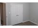Bedroom with double door closet and neutral walls at 3475 Washington Rd, Atlanta, GA 30344