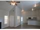 Open living room with high ceilings and hardwood floors at 3475 Washington Rd, Atlanta, GA 30344