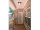 Brick back porch with wooden deck and door leading to backyard at 3475 Washington Rd, Atlanta, GA 30344