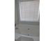 Bathroom with large soaking tub and window at 3475 Washington Rd, Atlanta, GA 30344