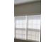 Bright bedroom with window and neutral walls at 3475 Washington Rd, Atlanta, GA 30344