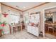 Cozy kitchen with white cabinets and a charming vintage hutch at 3112 Highway 155 N, Mcdonough, GA 30252