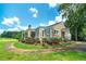 Stone house exterior with landscaped yard and walkway at 3112 Highway 155 N, Mcdonough, GA 30252