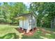 Small white storage shed on concrete blocks at 3112 Highway 155 N, Mcdonough, GA 30252