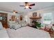 Bright living room featuring hardwood floors and a cozy fireplace at 3112 Highway 155 N, Mcdonough, GA 30252