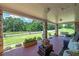 Covered porch overlooking a large yard at 3112 Highway 155 N, Mcdonough, GA 30252