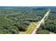 Aerial view of 21.33 acres of land including a home and Big Cotton Indian Creek at 3112 Highway 155 N, Mcdonough, GA 30252