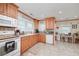 Bright kitchen with ample cabinetry, tile floors, and modern appliances at 3112 Highway 155 N, Mcdonough, GA 30252