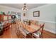 Bright dining room with hardwood floors and a view of the living room at 3112 Highway 155 N, Mcdonough, GA 30252