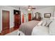 Main bedroom with hardwood floors, large bed and ample closet space at 3112 Highway 155 N, Mcdonough, GA 30252