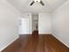 Spacious bedroom with hardwood floors and ceiling fan at 200 Renaissance Ne Pkwy # 302, Atlanta, GA 30308