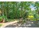 Large concrete patio with landscaping and garden features at 3154 Highway 155 N, Mcdonough, GA 30252