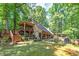 Ranch home with large deck and patio nestled in woods at 3154 Highway 155 N, Mcdonough, GA 30252