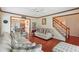 Comfortable living room with hardwood floors, neutral decor, and view of the entryway at 9334 Woodsboro Ct, Jonesboro, GA 30236