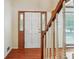 Inviting entryway with hardwood floors and staircase leading to upper levels at 9334 Woodsboro Ct, Jonesboro, GA 30236