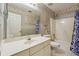 Bathroom with tub, shower, and vanity at 9334 Woodsboro Ct, Jonesboro, GA 30236