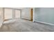 Bright bedroom with carpet, double doors and neutral walls at 9334 Woodsboro Ct, Jonesboro, GA 30236
