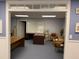 Finished basement office with L-shaped desk and seating area at 2631 Gladstone Ter, Woodstock, GA 30189