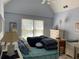 Light and airy bedroom with a dresser and twin bed at 2631 Gladstone Ter, Woodstock, GA 30189